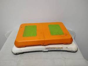 lot 176 image: Action Board Model C874 Interactive Learning Device and Wii balance board
