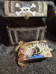 lot 15 image: Pirate Theme Treasure Chest Box with Handmade Scrapbook Album and Party Favor Lot