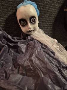 lot 57 image: Skeleton Skull Head Doll with Blue Hair and Dark Clothing