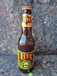 lot 97 image: Vintage Miller Lite Beer Bottle 12 oz