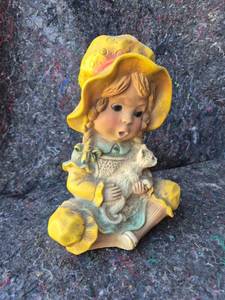lot 98 image: Child Figure Figurine Yellow Hat Holding Animal
