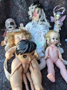 lot 104 image: Lot of 5 Dolls with Painted Faces and Hair, Various Styles