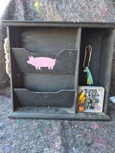 lot 111 image: Black Wooden Shelf with Pig Silhouette and Decorative Accents