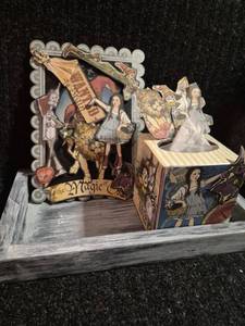 lot 112 image: The Magic of pop-up book with wizard wand and character figures