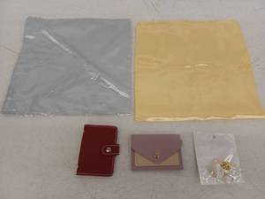 lot 12328 image: Lot of Satin Scarves, Card Holder Wallets and Gold-Tone seashell key ring