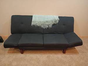 lot 935 image: Futon.  Lays flat and both ends come up to use as head rest.  See pictures. Located in basement.  32 x 91 x 21