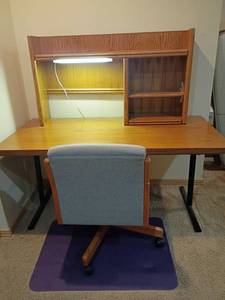 lot 937 image: Oak Desk with Removable Top, Light, Desk Chair and Under the Desk Mat.   Located in basement.   55 x 60 x 30