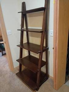 lot 938 image: Ladder Shaped Book Shelf.  73 x 29 x 21.  Located in basement