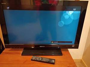 lot 939 image: 31in Sony Television with Remote.   Located in basement