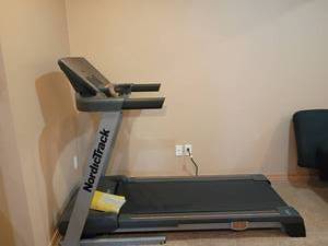 lot 942 image: Nordic Track Treadmill.   Located in basement