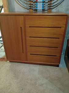 lot 948 image: Teak Wood ArmoireDresser.  7 Drawers and 3 Adjustable Shelves, 2 Drawers have felt liner.   Located in basement   45 x 48 x 19