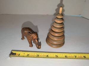 lot 1101 image: Small Wooden Stacking Ring Toy and Metal Elephant