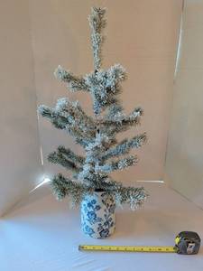lot 1112 image: Frosted 26 in Tabletop Tree with Blue Floral Ceramic Pot