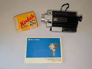 lot 1119 image: Bell & Howell Super 8 Movie Camera Models 2765 with Accessories