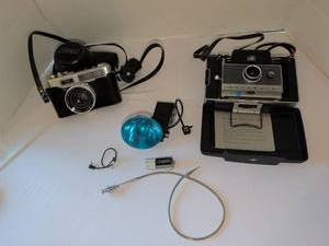 lot 1121 image: Yashica Electro 35 & Polarroid Land Camera Lot Self Timer, Flash, Accessories