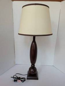 lot 1127 image: Table Lamp with Cream Shade and Dark Brown wood base. 30in tall
