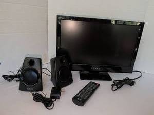 lot 1144 image: Dynex 18 in TV with Logitech speakers and remote