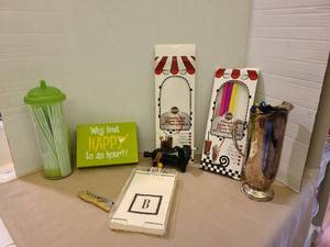 lot 1206 image: Reusable Silicone Straws with Cleaning Brushes, B Napkins with B on holder, and more