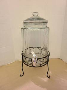 lot 1214 image: Glass Beverage Dispenser with Metal Stand and Spigot 18inches tall