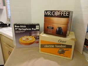 lot 1239 image: Non-Stick 9 inch Springform Pan and Oster Electric Fondue Lot and replacement coffee decanter