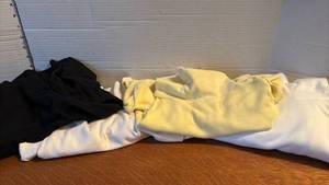 lot 1330 image: Four turtleneck shirts - size L