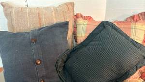 lot 1404 image: Four Decorative Pillows with Button Details and Plaid Pattern