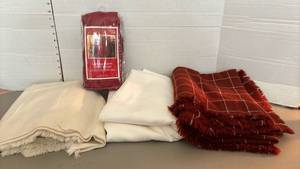 lot 1435 image: Three tablecloths and a chair cover