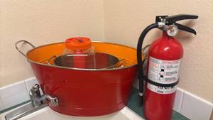 lot 1451 image: Red Handled Bucket with Fire Extinguisher and more