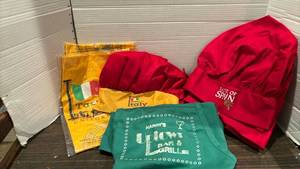 lot 2032 image: Taste of Spain and Taste of Italy Promotional Chef Hats and Aprons Lot, plus a Harry��s Uptown apron