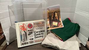 lot 2036 image: Readers Digest Complete Guide to Sewing Book and some material