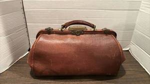lot 2037 image: Brown Leather Doctors Bag with Brass Hardware and a Handle