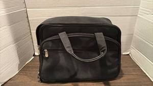 lot 2040 image: Black Bag with Shoulder Straps and Interior Compartments