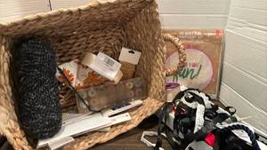 lot 2045 image: Basket of sewing supplies, including lots of ribbon