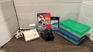 lot 2054 image: RadioShack Light Controller, Bushnell Binoculars, Storage Containers, Memory Card