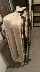 lot 2206 image: Folding Bedcot with Mattress Black Metal located in basement