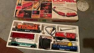 lot 2208 image: Lionel 027 Gauge Electric Train with Diesel Switcher Engine and Accessories No tracks included