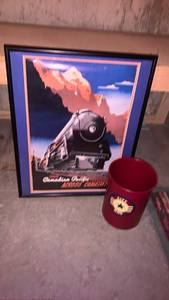 lot 2212 image: Canadian Pacific Across Canada Framed Poster 28X22 and trash can