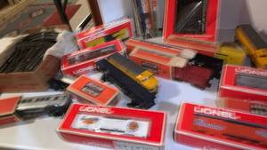 lot 2213 image: Lionel Trains Large Lot with tracks  located in basement