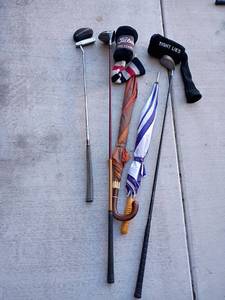 lot 3007 image: Golf Clubs, Odyssey, Titleist Pro Titanium, Adam Tight Lies and Umbrellas