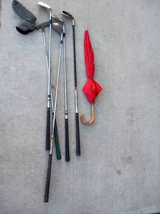 lot 3009 image: Golf Clubs. Cleveland and Taylor Made Plus Umbrella with Carved Handle