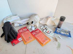 lot 3216 image: Golf balls, New Spyder gloves, The Heat Solution Hand Warmers and more