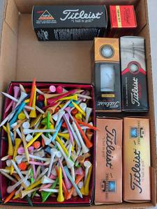 lot 3219 image: Titleist Golf Balls and tees lot