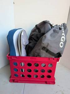lot 3228 image: Seat cushion, lap desk and X Cargo auto cargo rack in plastic crate. See pics.