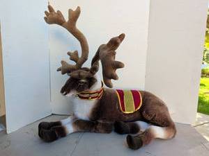 lot 3303 image: Plush Reindeer Figurine with Red and Gold Decorative Collar 24x24