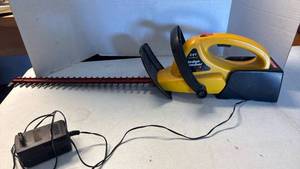 lot 3416 image: Craftsman cordless hedge trimmer with charger