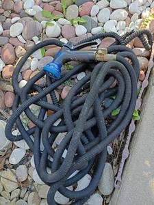 lot 4002 image: Garden Hose with Sprayer