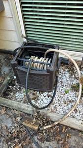 lot 4100 image: Hose reel with hose