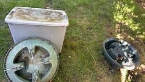 lot 4106 image: Large plastic tote and 2 Christmas tree stands