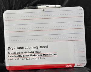 lot 1025 image: Staples Dry-Erase Learning Board Double-Sided Ruled Blank 8.9 x 11.8 in 61296 - Retail $0