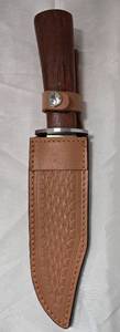 lot 1080 image: Browning Fixed Blade Knife with Sheath 7 inch Blade - Retail $0